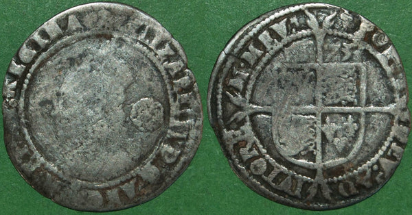 Elizabeth the First sixpence dated 1573 with mintmark acorn, the reverse over ermine