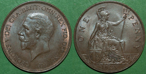 George the Fifth third issue 1929 bronze penny with small bare head bust and Britannia seated right reverse.