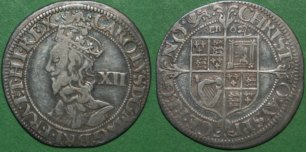 Charles the First York Mint Civil War shilling with dies Besly 1+B, depicting a coarser bust and square topped shield with EBOR above and twigs in the cross ends.