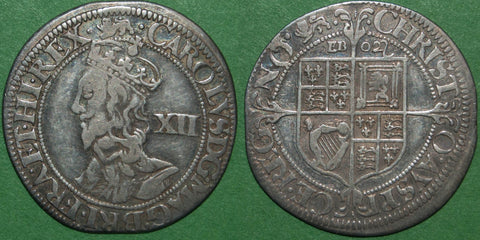 Charles the First York Mint Civil War shilling with dies Besly 1+B, depicting a coarser bust and square topped shield with EBOR above and twigs in the cross ends.
