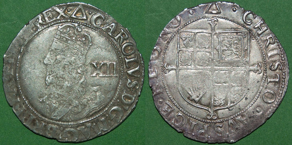 A Charles I group F large bust shilling with single arch crown and mintmark triangle, dating it to 1639-40. Cleanly struck, though a little soft in parts and weighs 5.77 grams. The grade is nearly very fine and the price is £180.