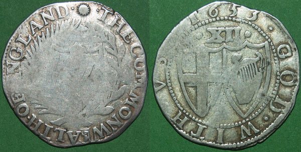 A 1653 Commonwealth shilling with a flat obverse  and more detail to the reverse.  The weight is 5.63 grams and the grade is almost fine for the obverse and fine for the reverse. The price is £275.