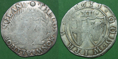 A 1653 Commonwealth shilling with a flat obverse  and more detail to the reverse.  The weight is 5.63 grams and the grade is almost fine for the obverse and fine for the reverse. The price is £275.