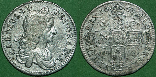 A Charles I 1663 first bust shilling with good detail, but pitted surfaces as it was presumably a detector find. The grade is almost very fine and it has been cleaned. The price is £275.