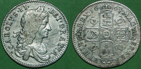 A Charles I 1663 first bust shilling with good detail, but pitted surfaces as it was presumably a detector find. The grade is almost very fine and it has been cleaned. The price is £275.