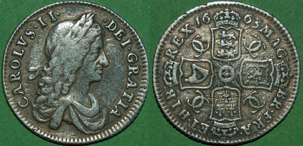 A 1663 Charles I first bust shilling, toned with light surface marks  and has been cleaned at some time in the past. The grade is nearly very fine and the price is £295.