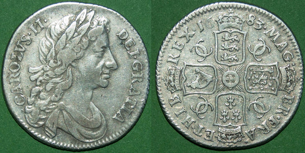A Charles II 1683 fourth bust shilling. Wear to the high points  and very fine. A rare coin. The price is £800.