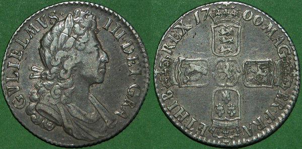 A William III 1700 fifth bust shilling with circular 0's in the date. Nicely toned, but a scratch through the hair and even wear to both sides. The grade is very fine and the price is £110.