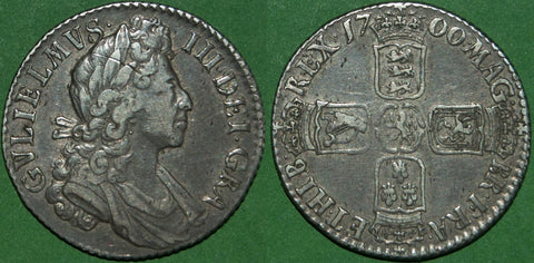 A William III 1700 fifth bust shilling with circular 0's in the date. Nicely toned, but a scratch through the hair and even wear to both sides. The grade is very fine and the price is £110.