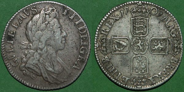 A 1701 William III fifth bust shilling with no stop after DEI in the obverse legend. There is light haymarking and the grade is very fine on the obverse, good very fine on the reverse. The price is £275.
