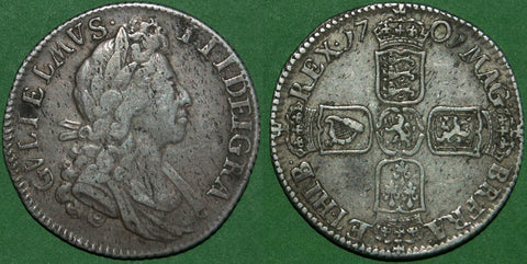 A 1701 William III fifth bust shilling with no stop after DEI in the obverse legend. There is light haymarking and the grade is very fine on the obverse, good very fine on the reverse. The price is £275.