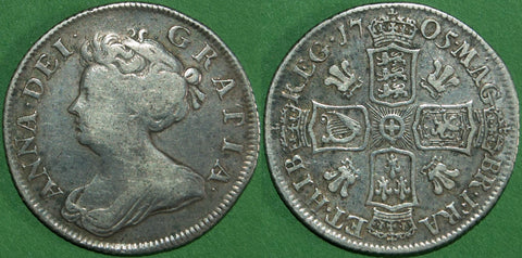 Anne 1705 second bust shilling with plumes in the reverse angles. It is toned with even wear to both sides, the grade is good fine and the price is £200. A scarce coin.