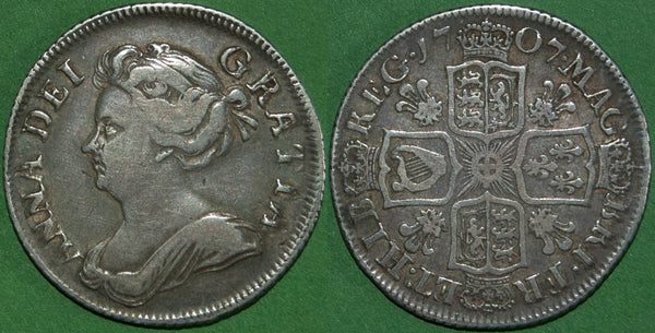 Anne 1707 third bust shilling with plumes in the reverse angles. The grade is good fine with even wear to both sides and the price is £150. A scarce coin.