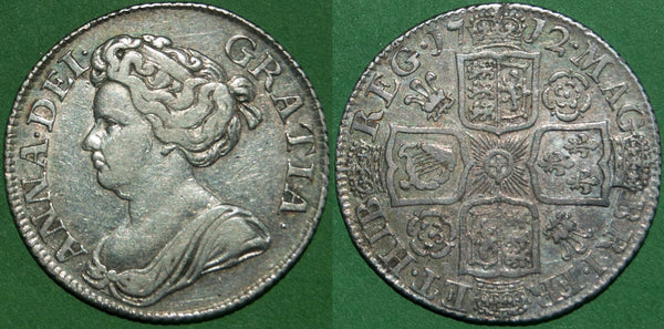 Anne 1712 fourth bust shilling with roses and plumes in the reverse angles.  Toned with even wear to the higher points both sides, the grade is good very fine and the price is £300. 