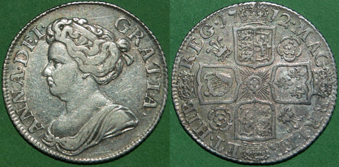 Anne 1712 fourth bust shilling with roses and plumes in the reverse angles.  Toned with even wear to the higher points both sides, the grade is good very fine and the price is £300. 