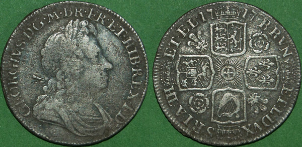 George I 1717 shilling with roses and plumes in the angles. Decent detail and nearly very fine for wear, but pitted surfaces. The price is £120.