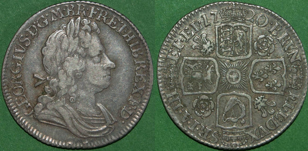 George I 1720 shilling with roses and plumes in the reverse angles. Evenly worn both sides, the obverse about very fine, the reverse good very fine. The price is £300.