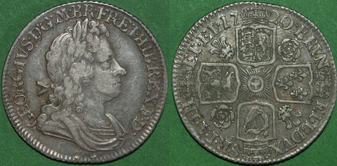 George I 1720 shilling with roses and plumes in the reverse angles. Evenly worn both sides, the obverse about very fine, the reverse good very fine. The price is £300.