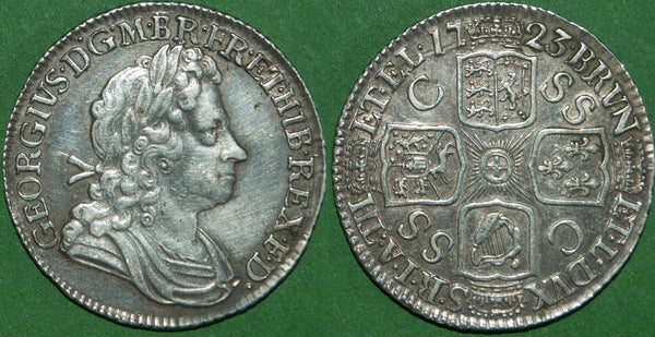George I 1723 first bust SSC shilling. Lightly toned and cleaned at some point in time. Good very fine and the price is £250.