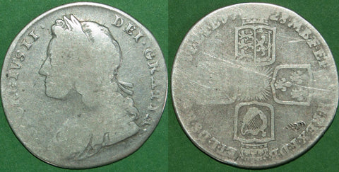 George II 1728 shilling with plain angles. A low grade coin that is fair at best, but most detail remains. The price is £50.
