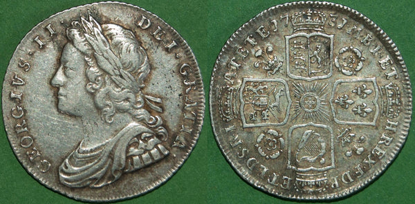 George II 1731 shilling with roses and plumes in the angles. Pleasingly toned with only light wear to both sides. The grade is a bold very fine or better. The price is £400.