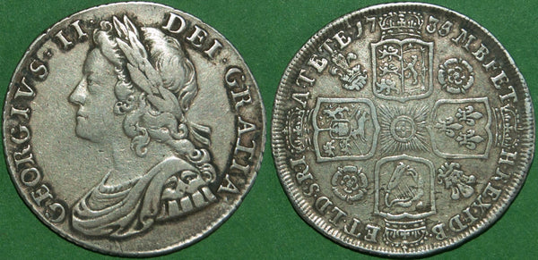 George II 1735  younghead shilling with roses and plumes in the angles. Toned with even wear and better than very fine. The price is £300.