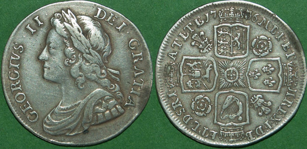 George II 1736 young head shilling with roses and plumes in angles. Toned with even wear to both sides. Grades very fine and the price is £250.