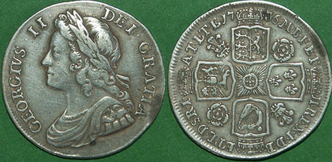 George II 1736 young head shilling with roses and plumes in angles. Toned with even wear to both sides. Grades very fine and the price is £250.
