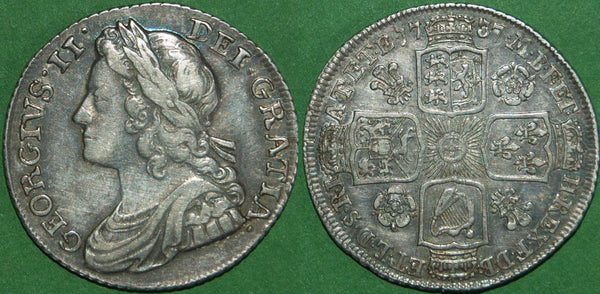 George II 1737 young head shilling with roses and plumes in angles. Toned with even wear. Grades very fine and the price is £250.