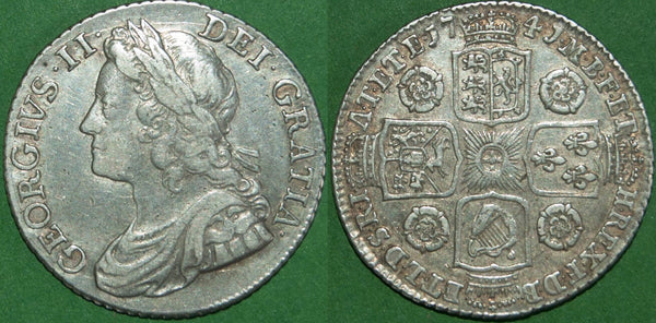 George II 1741 young head shilling with roses in the angles. Lightly toned with wear and some deposits in the devices. Graded very fine and the price is £195.