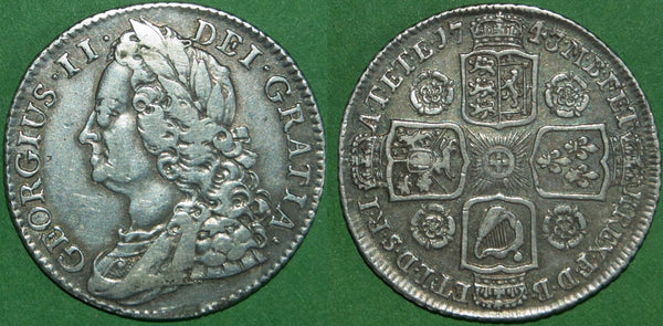 George II 1743 old head shilling with roses in the angles. There is some wear to the obverse which is almost very fine, while the reverse is better and attractively toned. The price is £125.