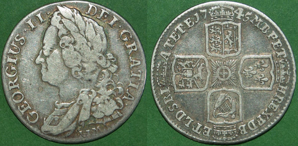 George II 1745 LIMA shilling with general wear to both sides and toned with light surface marks. The grade is good fine and the price is £60.