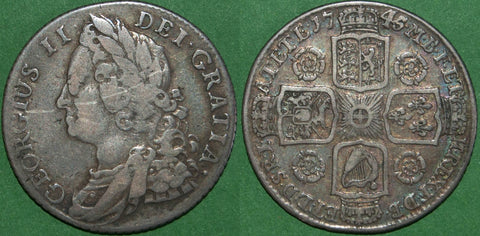George II 1745 old head shilling with roses in angles. Quite attractive with an old tone, but a scratch across the head detracts. Grades good fine with the reverse very fine and the price is  £110.
