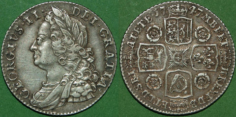 George II 1747 old head shilling with roses in angles. Toned with light wear to the higher points. The grade is a bold very fine and the price is £200.