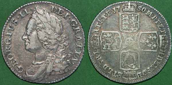 George II 1750/7 old head shilling. It has an old cabinet tone with moderate wear to both sides and grades near very fine. The price is £140. Scarce.