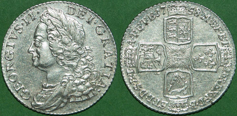 George II 1758 old head shilling. It has been dripped and is bright. There is wear to the laurels and the hair, but less to the reverse. The grade is extremely fine with the obverse nearly so. The price is £200.