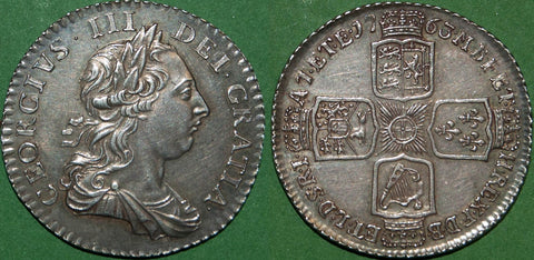 George III 1763 'Northumberland' shilling. Toned with rub to the higher points, but quite attractive in hand. The grade is almost extremely fine and the price is £1200.