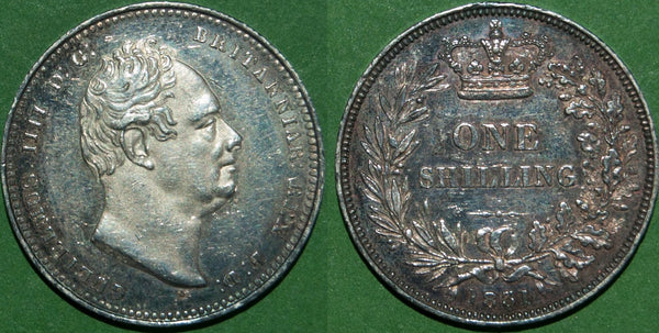 William IV 1831 plain edge proof shilling as issued in the sets. Slightly impaired with some tiny marks in the fields and wear to the high points. Grade is extremely fine and the price is £1000.