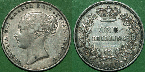 Victoria 1853 shilling. Toned with a couple of spots and the obverse lightly brushed.  Grades good very fine. The price is £100.