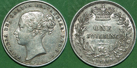 Victoria 1857 shilling with light wear and marks to both sides. The grade is good very fine and the price is £75.