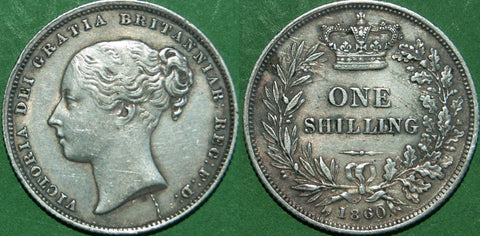 Victoria 1860 young head shilling with light wear  but multiple scratches to the reverse. The grade is nearly extremely fine, but with the caveat of the marks seen. The price is £100.