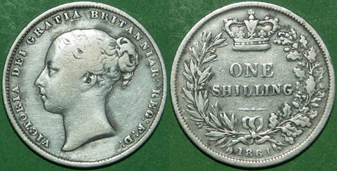 Victoria 1861 shilling with general wear and grades good fine. The price is £25.