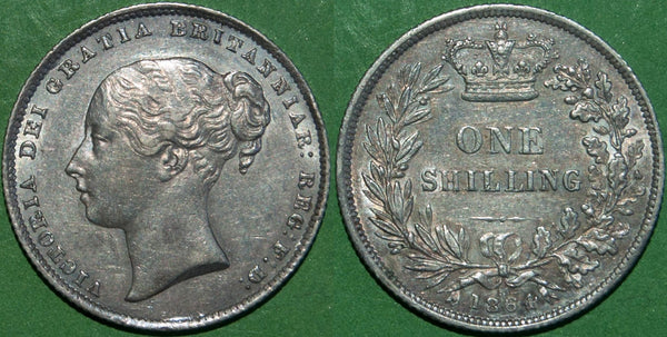Victoria 1864 second young head shilling with die. no.15 on the reverse. Almost extremely fine and the price is £135.