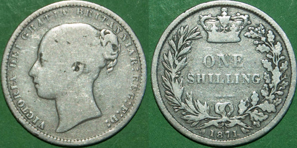 Victoria 1871 shilling with die number 39. Worn  and almost fine. The price is £15.