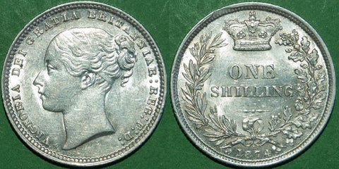 Victoria 1874 third bust shilling with reverse die no. 1 and a crosslet 4, this scarce.  The grade is good extremely fine with only a trace of wear to the high points. The price is £250. 