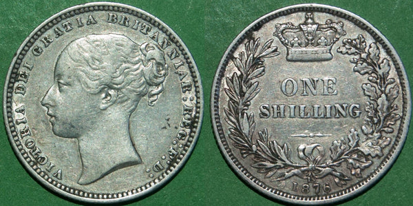 Victoria 1876 shilling with reverse die number 15. Grades very fine, with even wear and some deposits in the recesses. The price is £45.
