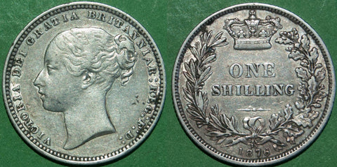 Victoria 1876 shilling with reverse die number 15. Grades very fine, with even wear and some deposits in the recesses. The price is £45.