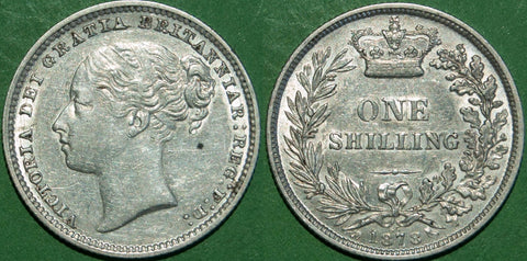 Victoria 1878 third head shilling with die number 65. Light wear and a scrape below the chin. Grades nearly extremely fine with the reverse slightly better. The price is £125. Scarce.