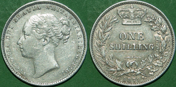 Victoria 1879 fourth young head shilling with no die number. It retains decent detail and grades nearly extremely fine, but there are many small contact marks. The price is £60.