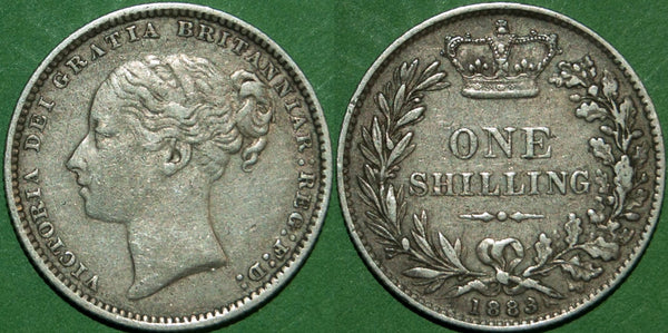Victoria 1883 fourth young head shilling , toned with wear to the higher points. Grades better than very fine and the price is £40.